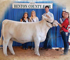 Jessica Janssen with her 2014 Grand Champion Heifer